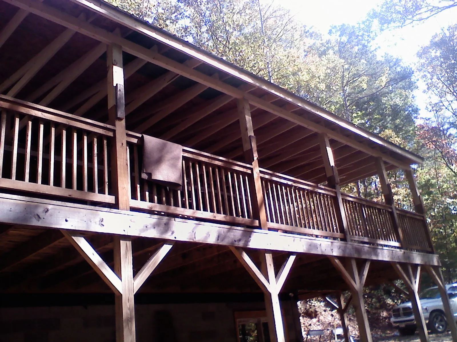 Timber framing under a new elevated porch and deck — Roof Leak Repair in Eldorado Springs by Roofing Brothers